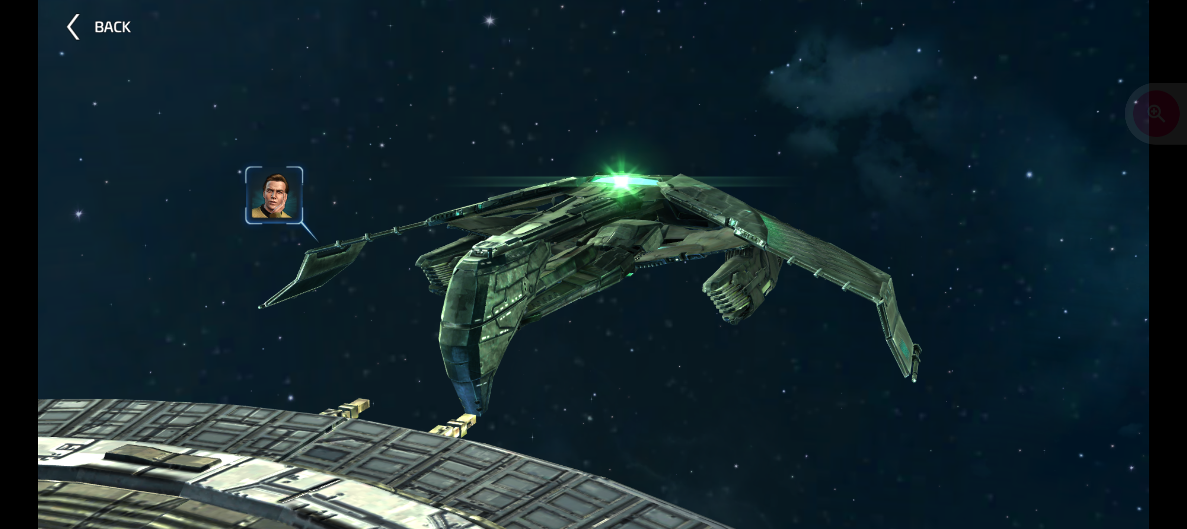 A futuristic spacecraft is flying through space, accompanied by a small inset portrait of a person.